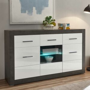Brandolf Wohnzimmer Schrank in Weiß Hochglanz und Beton Grau Glaseinsatz